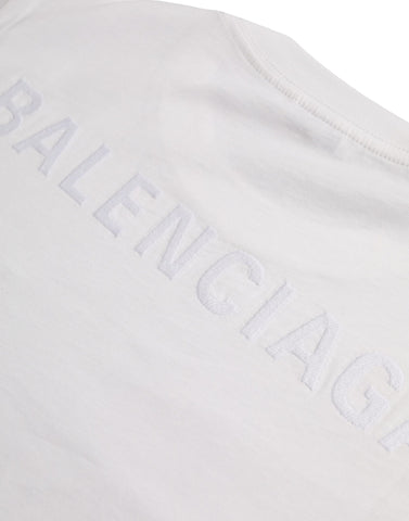 White cotton crew neck short sleeve T-shirt by Balenciaga, showing the plain front design and soft fabric texture.