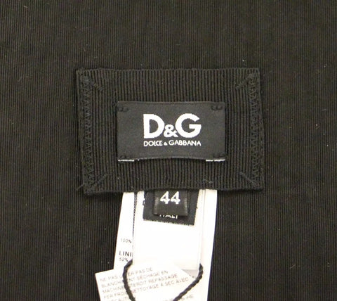 Black silk women's waist cummerbund by Dolce & Gabbana, featuring smooth fabric and elegant design for formal wear.