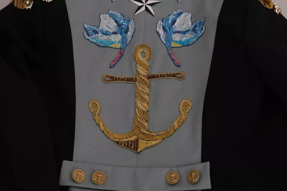 Blue cotton jacket by Dolce & Gabbana with crystal button embellishments and elegant design.