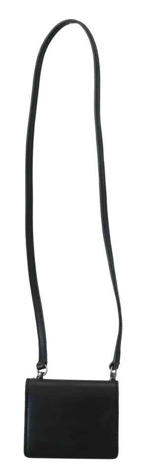 Black leather bifold shoulder sling wallet for women by Dolce & Gabbana, featuring compact design and secure snap closure.