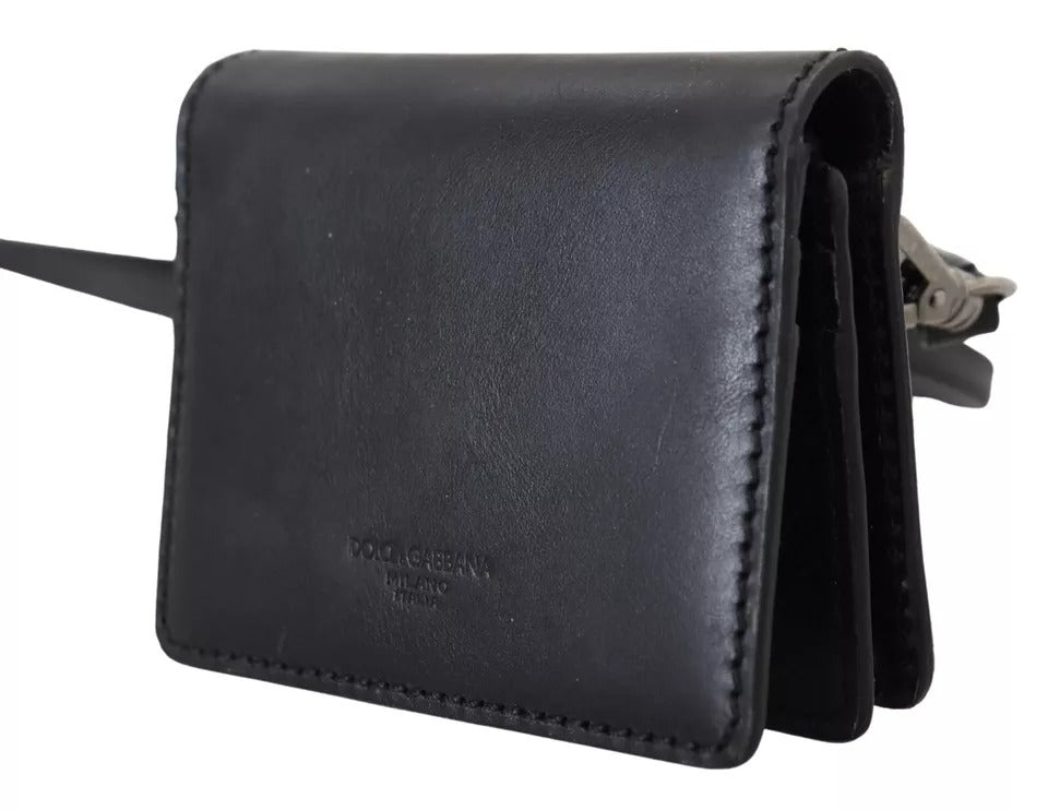 Black leather bifold shoulder sling wallet for women by Dolce & Gabbana, featuring compact design and sleek style.