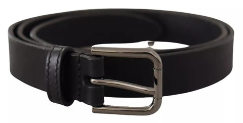 Black calf leather belt with classic metal logo buckle by Dolce & Gabbana, featuring a sleek and stylish design.