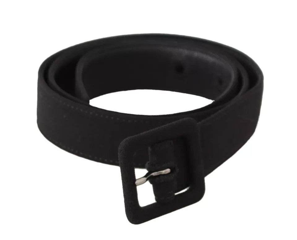 Black velvet leather waist belt with a gold logo buckle from Dolce & Gabbana, shown in a close-up image.