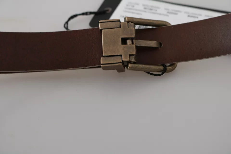 Cream beige leather belt with gold buckle from Dolce & Gabbana, featuring a sleek waist design and elegant craftsmanship.