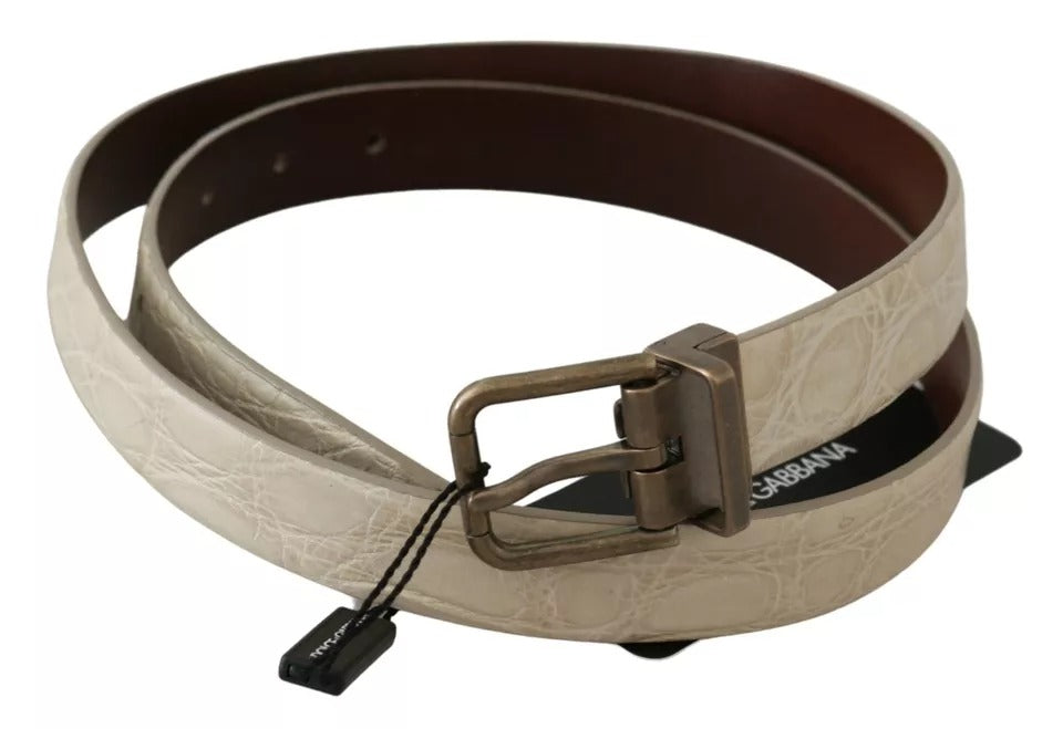 Cream beige leather belt with gold buckle from Dolce & Gabbana, featuring a sleek waist belt design.