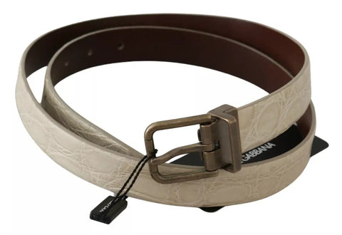 Cream beige leather belt with gold buckle from Dolce & Gabbana, featuring a sleek waist belt design.