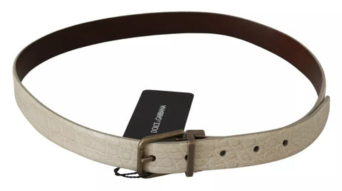 Cream beige leather belt with gold buckle from Dolce & Gabbana, featuring a sleek waist design and elegant craftsmanship.