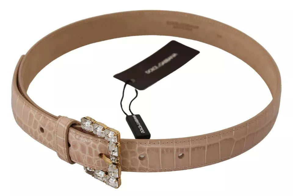Beige leather women's belt with crystal buckle from Dolce & Gabbana, featuring a stylish and elegant accessory.