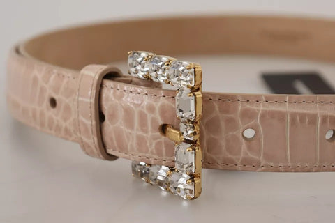 Beige leather women’s belt with crystal buckle from Dolce & Gabbana, featuring a stylish and elegant accessory.