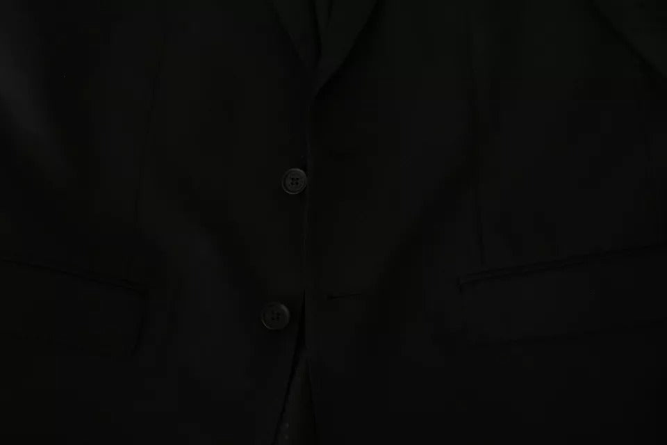 Black wool slim fit notch blazer jacket by Dolce & Gabbana, tailored with a sleek, modern design and classic lapel collar.