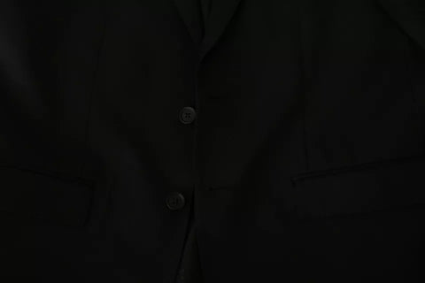 Black wool slim fit notch blazer jacket by Dolce & Gabbana, tailored with a sleek, modern design and classic lapel collar.