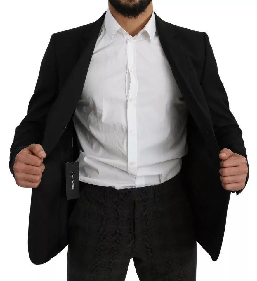 Black wool slim fit notch blazer jacket by Dolce & Gabbana, tailored with a sleek lapel and structured fit.