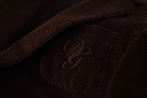 Brown corduroy slim fit coat blazer with Dolce & Gabbana logo, showcasing the tailored design and classic style.