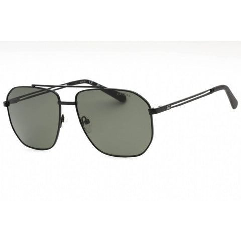 Guess GF5092_02N sunglasses by Jag Couture London-New York with black frames and dark tinted lenses, stylish and modern design.