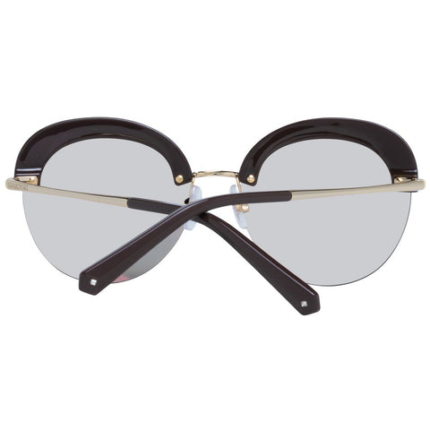 Swarovski gold metal and plastic sunglasses with stylish frame and tinted lenses, fashionable accessory for sunny days