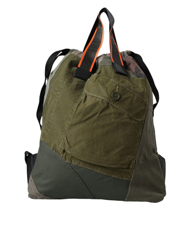Military green patchwork rucksack backpack by Dolce & Gabbana, featuring multiple compartments and adjustable shoulder straps.
