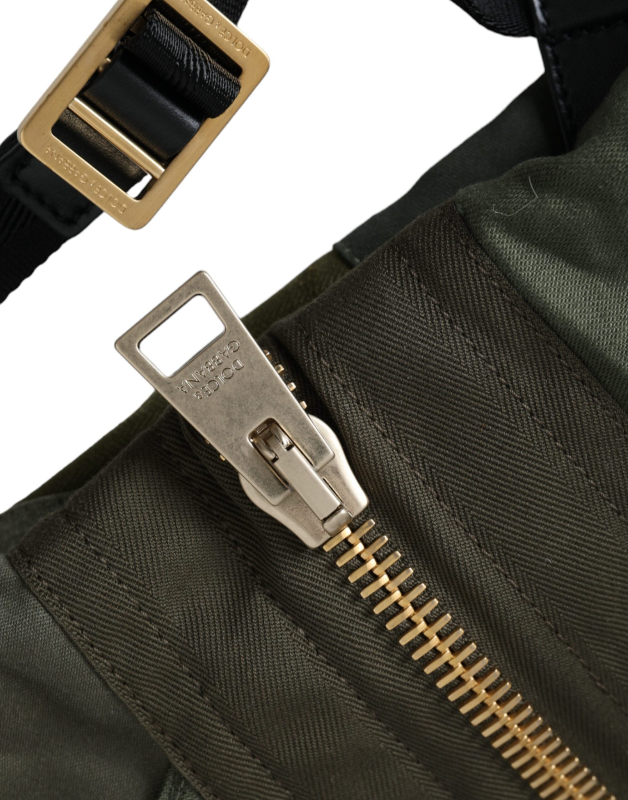 Dolce & Gabbana military green patchwork rucksack backpack showing adjustable straps and spacious main compartment.
