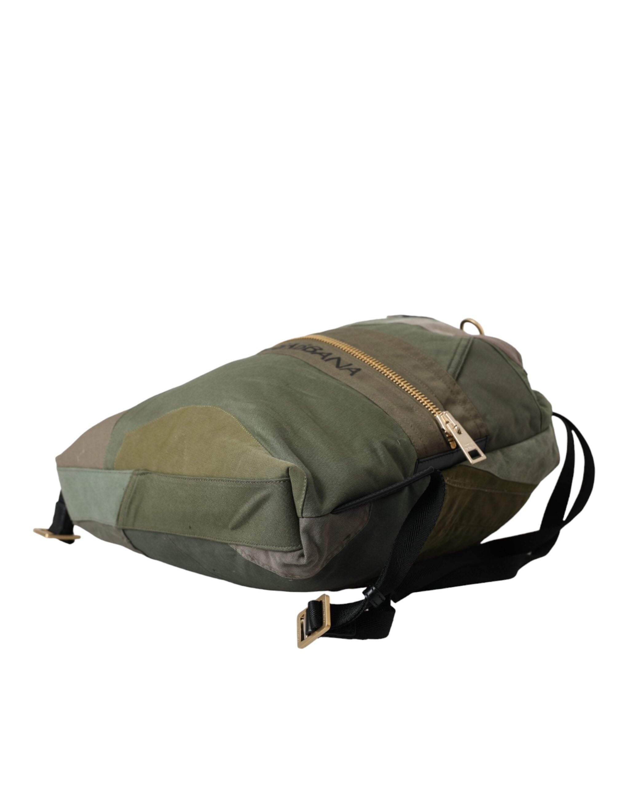 Dolce & Gabbana military green patchwork rucksack backpack with adjustable straps and multiple compartments.