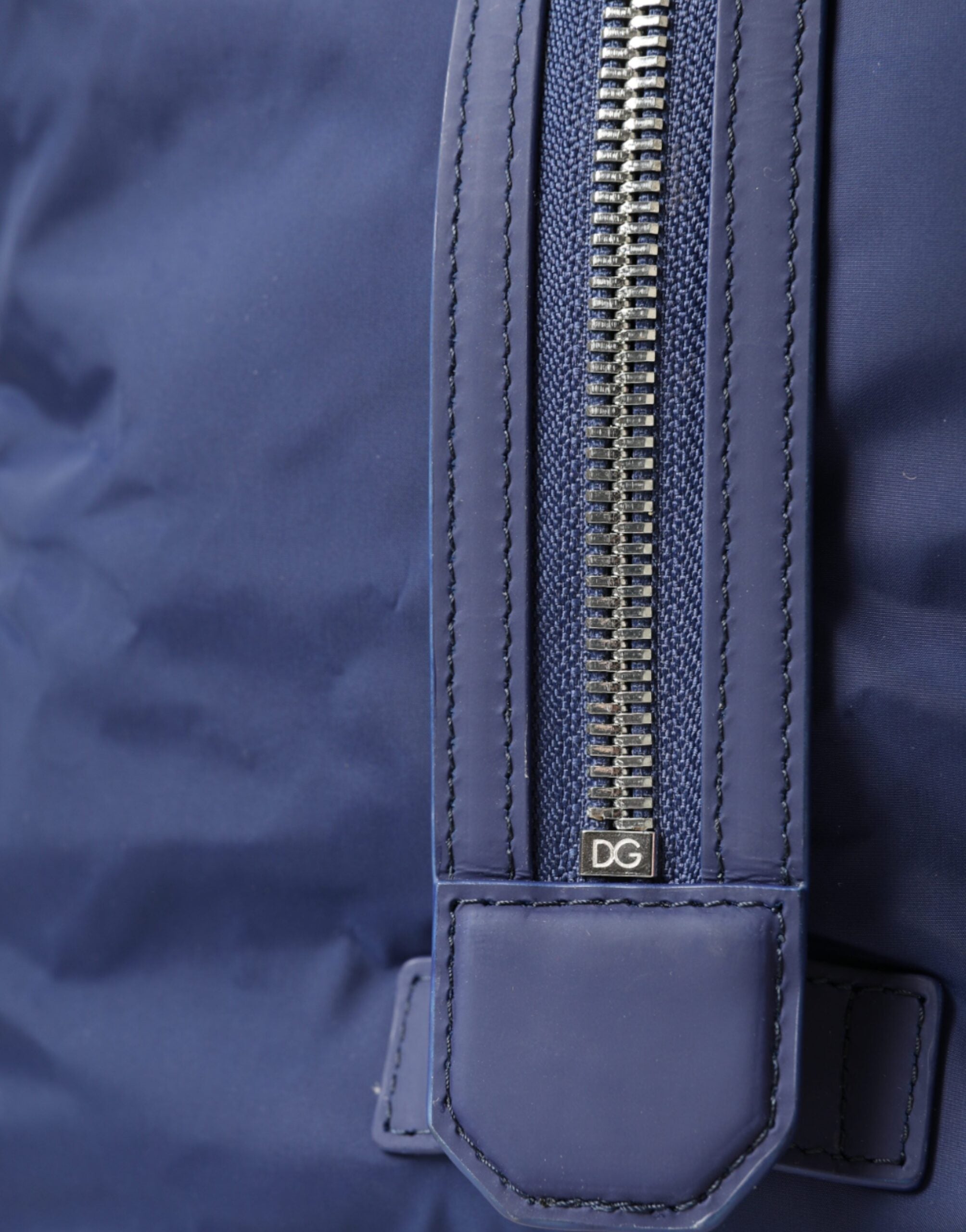 Blue nylon and calfskin Dolce & Gabbana hand shoulder duffel bag with sturdy handles and sleek design.