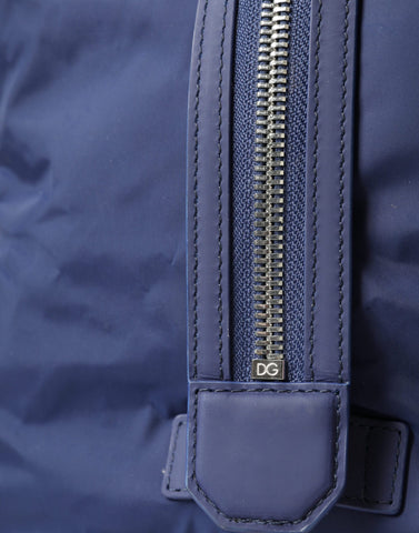 Blue nylon and calfskin Dolce & Gabbana hand shoulder duffel bag with sturdy handles and sleek design.