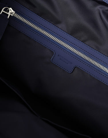 Blue nylon and calfskin Dolce & Gabbana hand shoulder duffel bag with sleek design and sturdy handles.