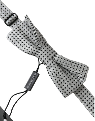 Gray silk polka dot adjustable men's bow tie with papillon style by Dolce & Gabbana, featuring classic polka dot pattern and elegant design.