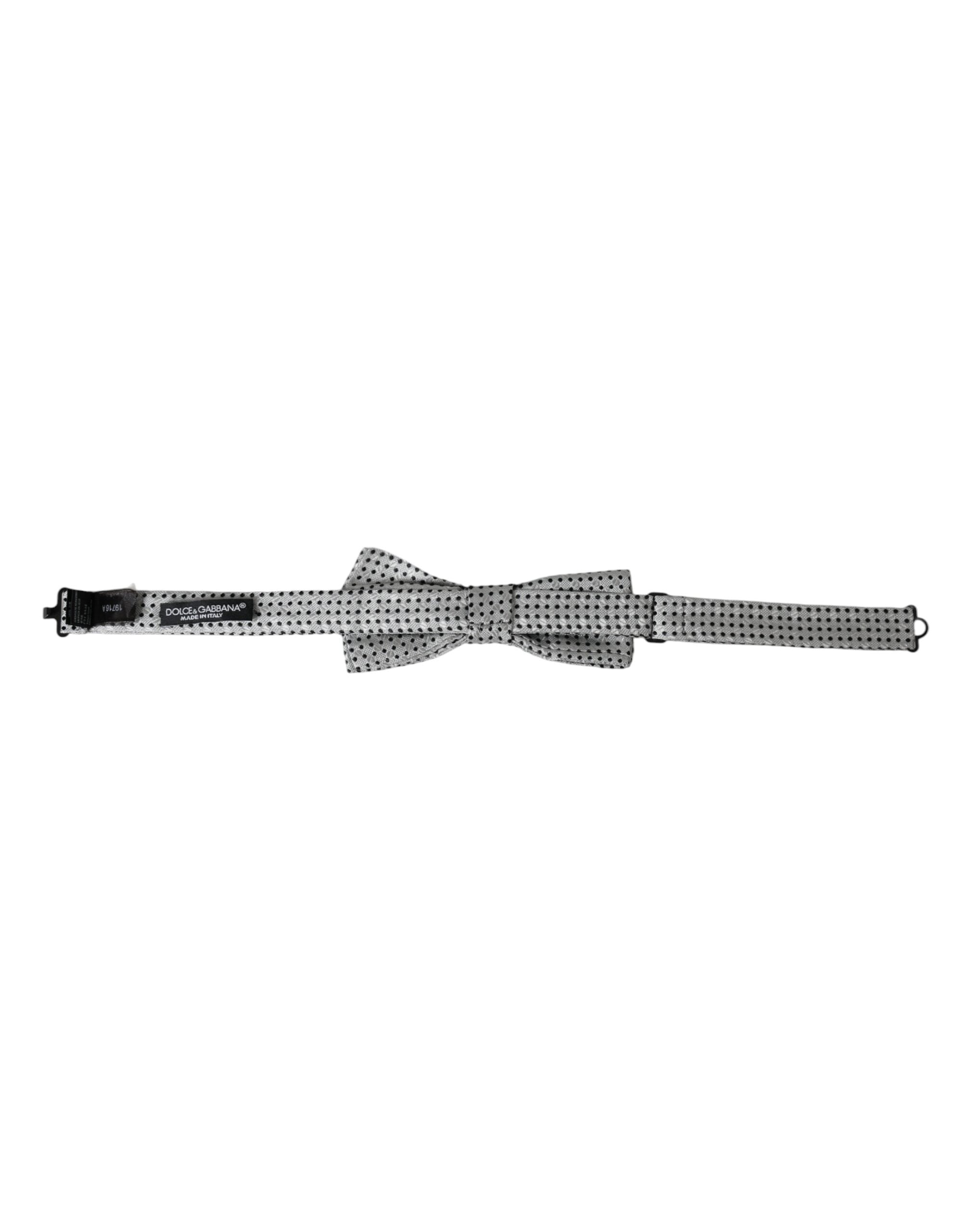 Gray silk polka dot adjustable neck bow tie by Dolce & Gabbana, showcasing classic pattern and elegant design.