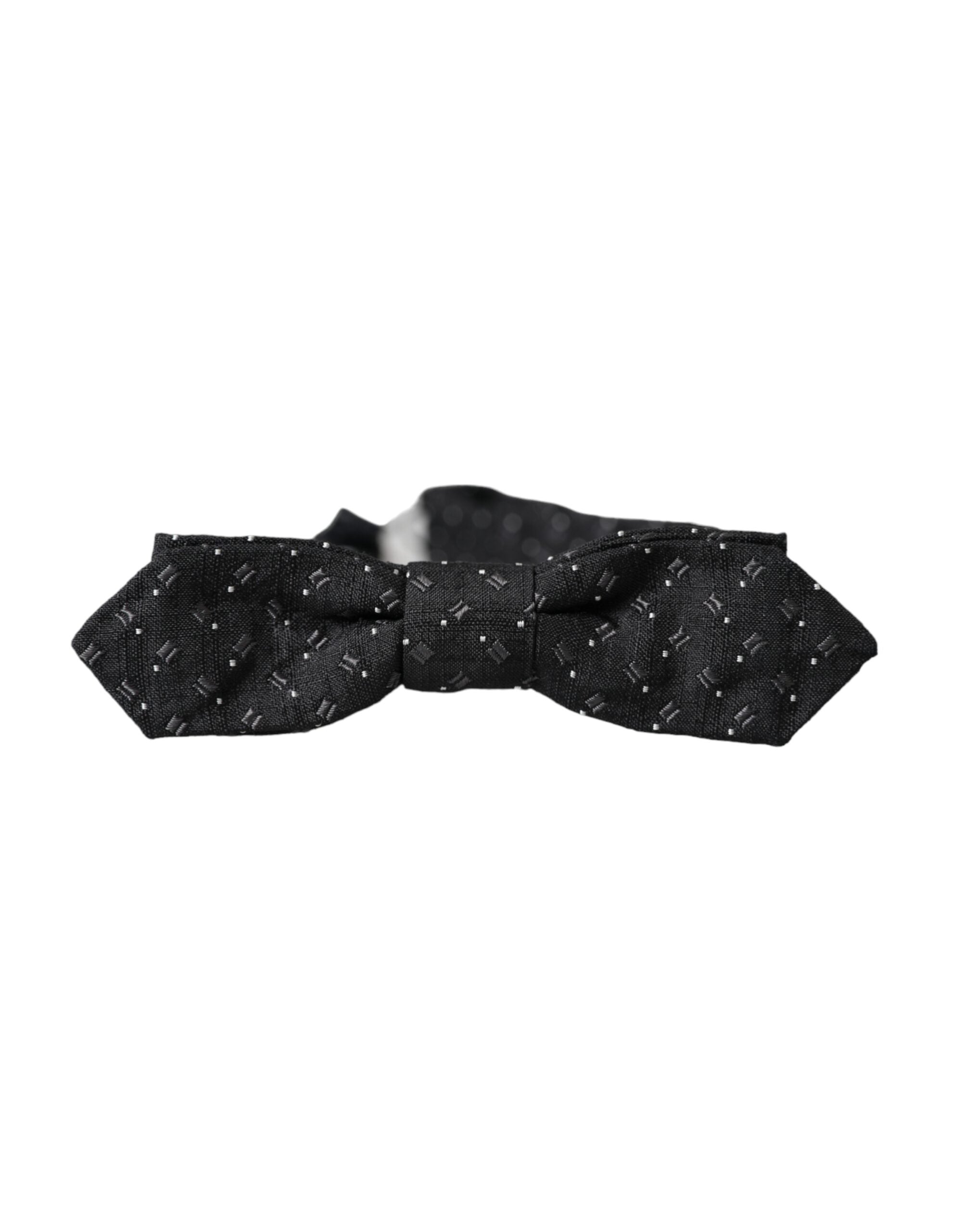Black silk patterned adjustable neck bow tie for men by Dolce & Gabbana, featuring a stylish papillon design.