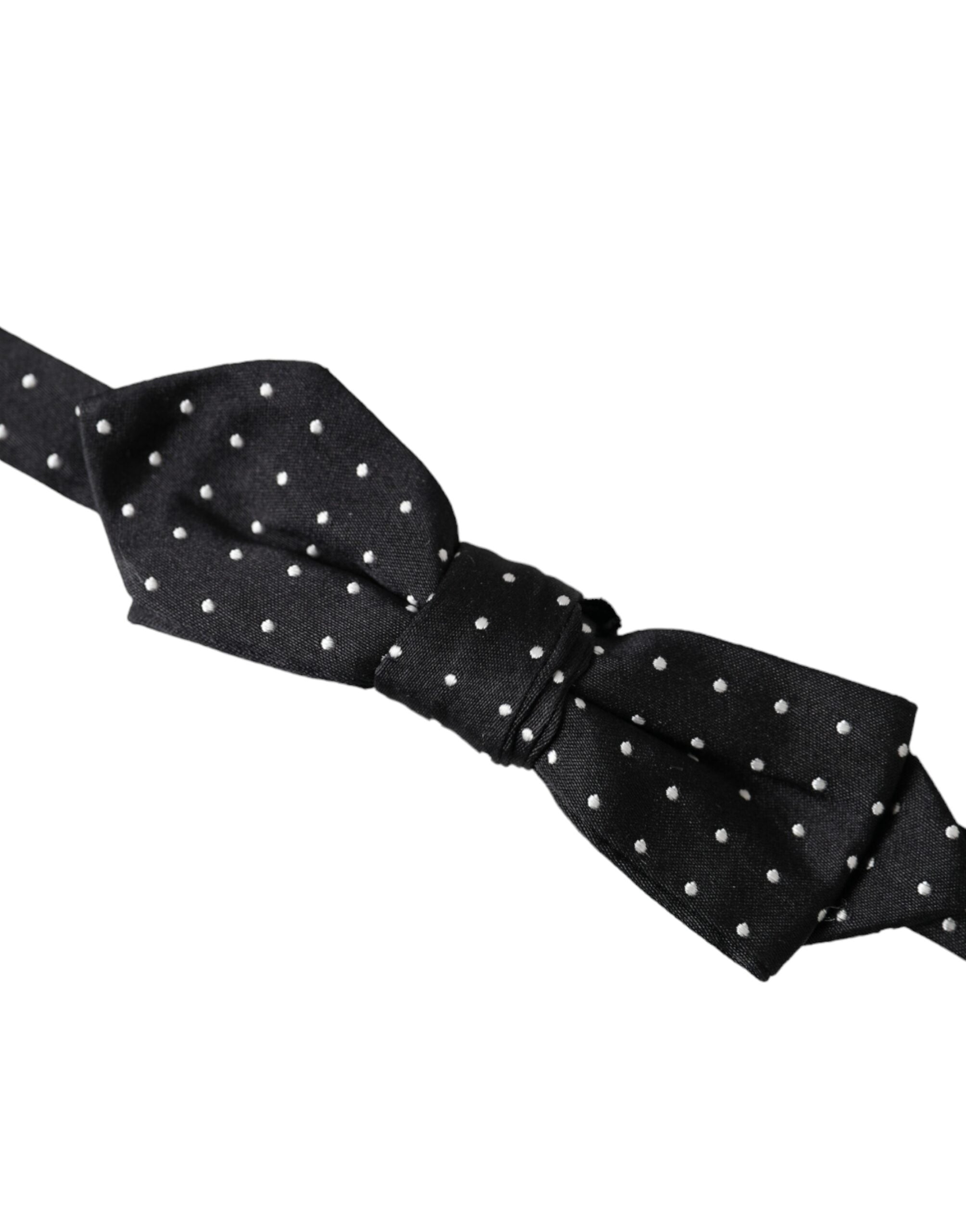Black silk polka dot adjustable men's bow tie with papillon style by Dolce & Gabbana, featuring a classic design and elegant fabric.