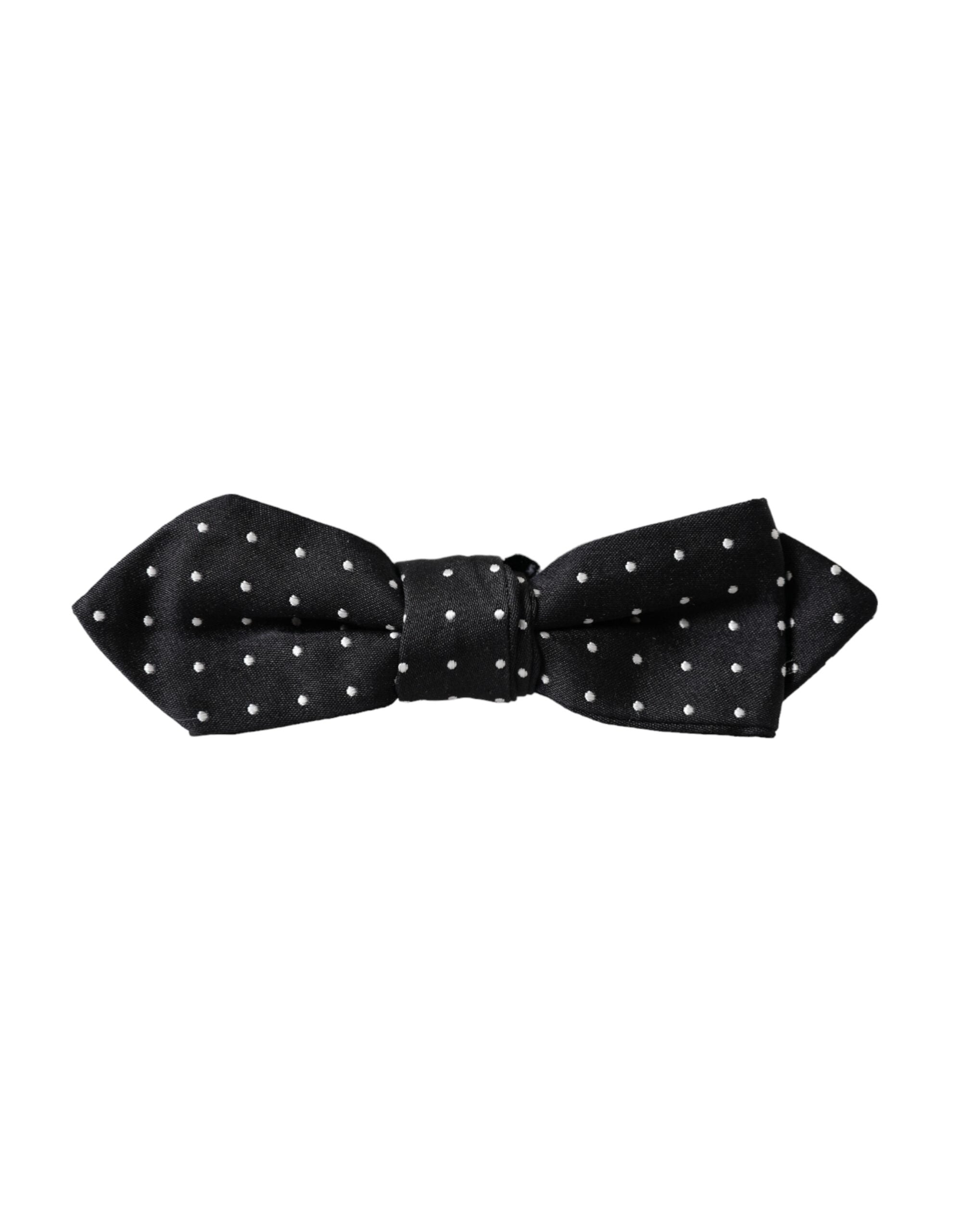 Black silk polka dot adjustable men's bow tie with papillon style from Dolce & Gabbana, featuring a classic polka dot pattern.