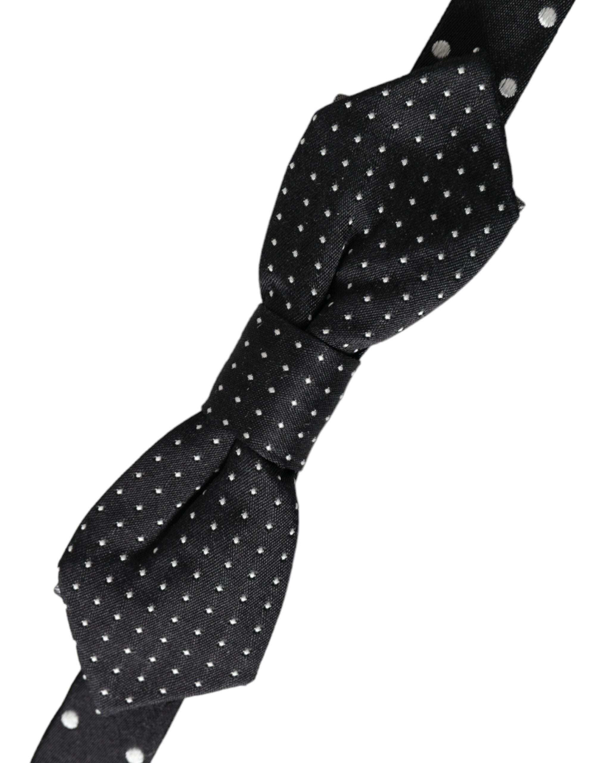 Black silk polka dot adjustable neck bow tie for men by Dolce & Gabbana, featuring classic style and elegant design.
