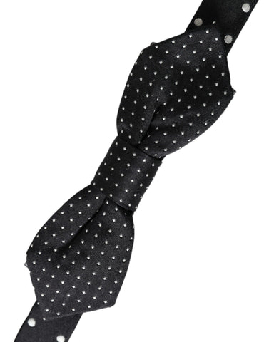 Black silk polka dot adjustable neck bow tie for men by Dolce & Gabbana, featuring classic style and elegant design.