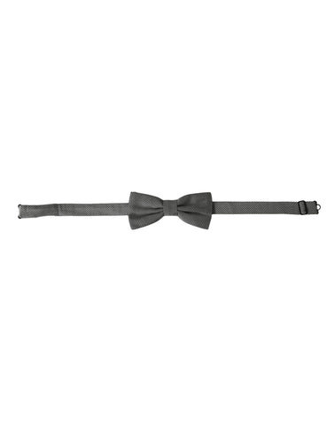 Gray silk patterned adjustable neck bow tie for men by Dolce & Gabbana, featuring a stylish and elegant papillon design.