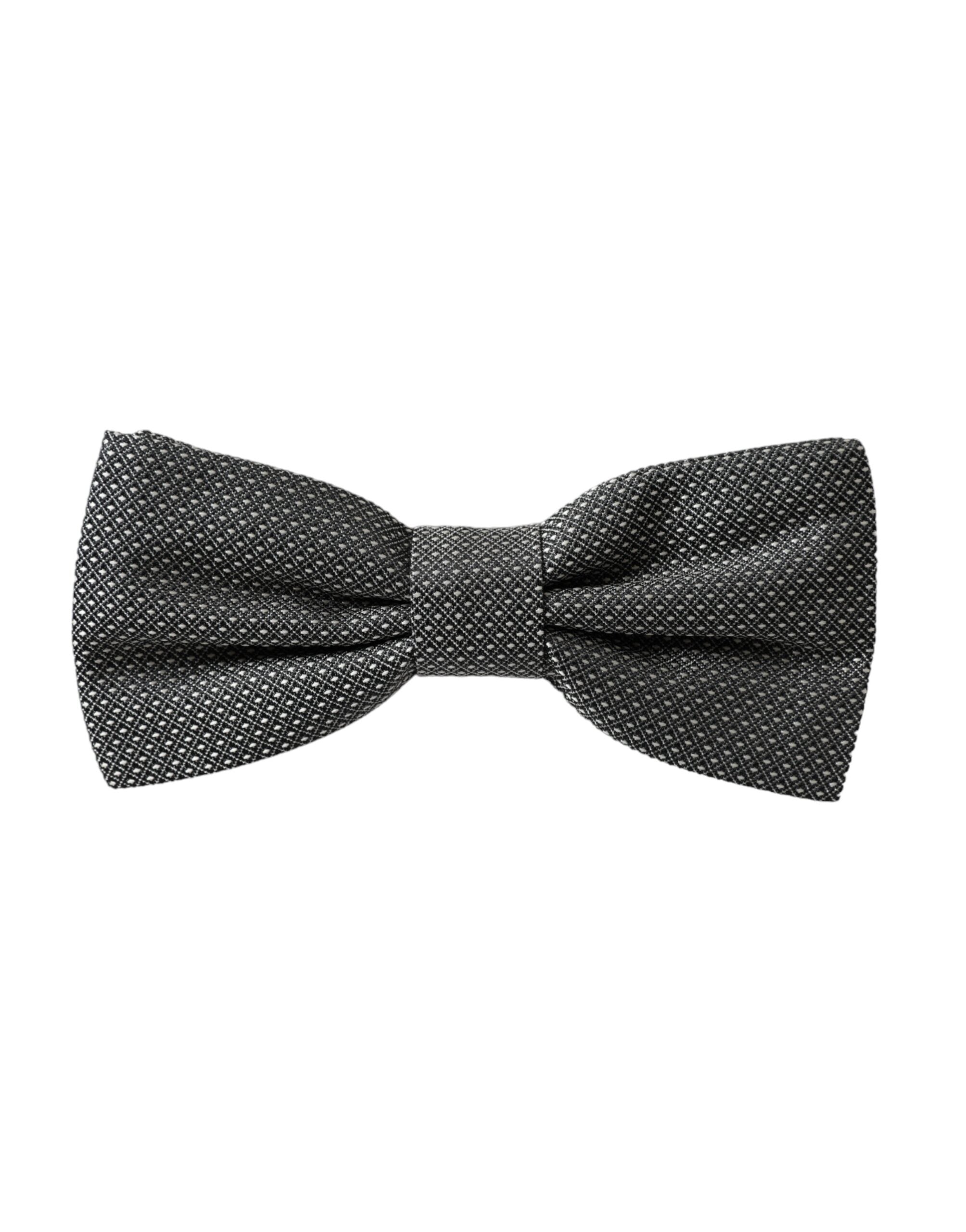 Gray silk patterned adjustable neck bow tie for men by Dolce & Gabbana, featuring a stylish papillon design and classic elegance.