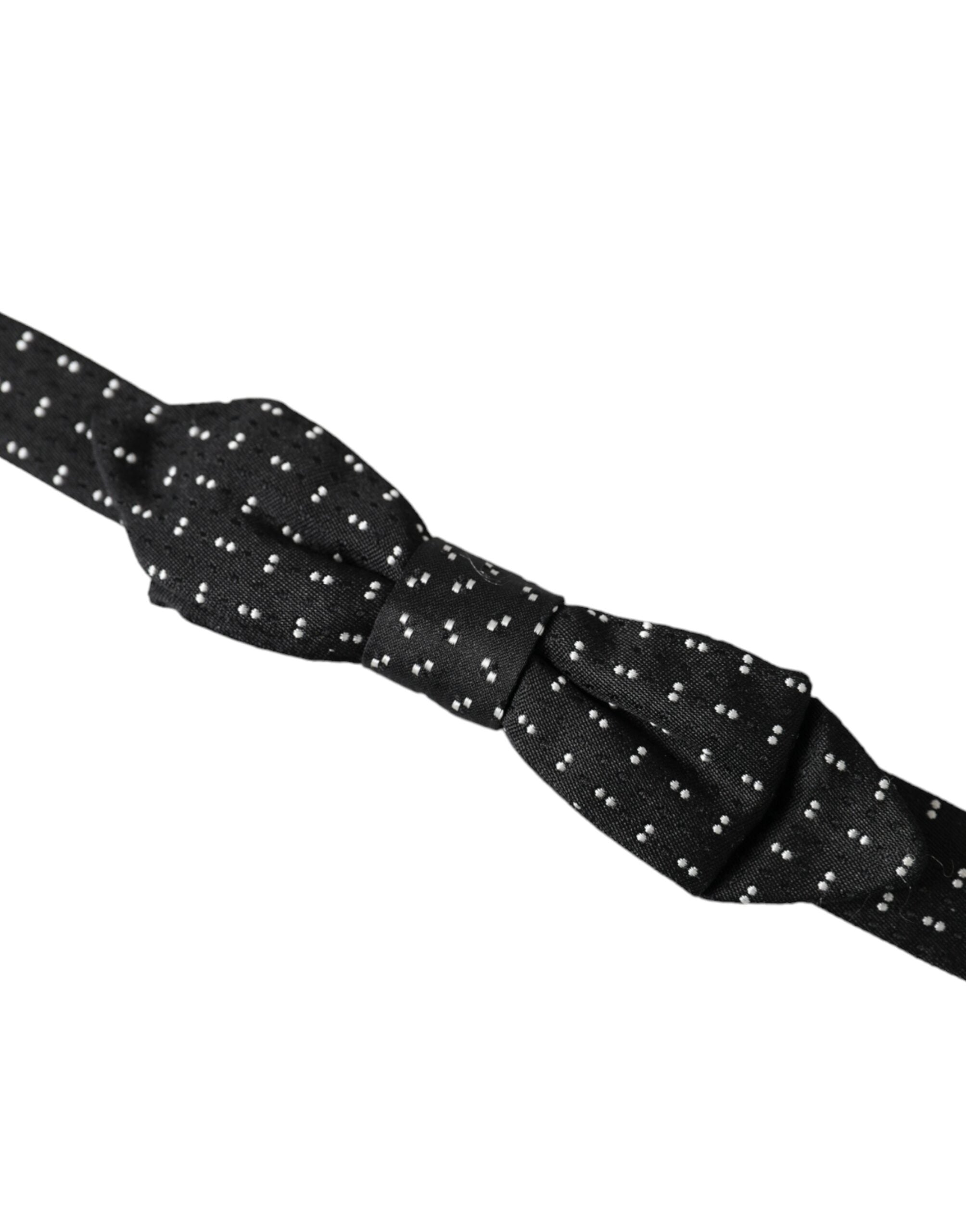 Black silk patterned adjustable neck bow tie for men by Dolce & Gabbana, featuring a stylish papillon design.