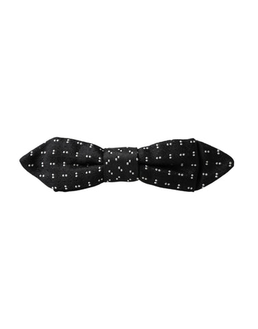 Black silk patterned adjustable men's bow tie with papillon style from Dolce & Gabbana, featuring elegant design and classic shape.
