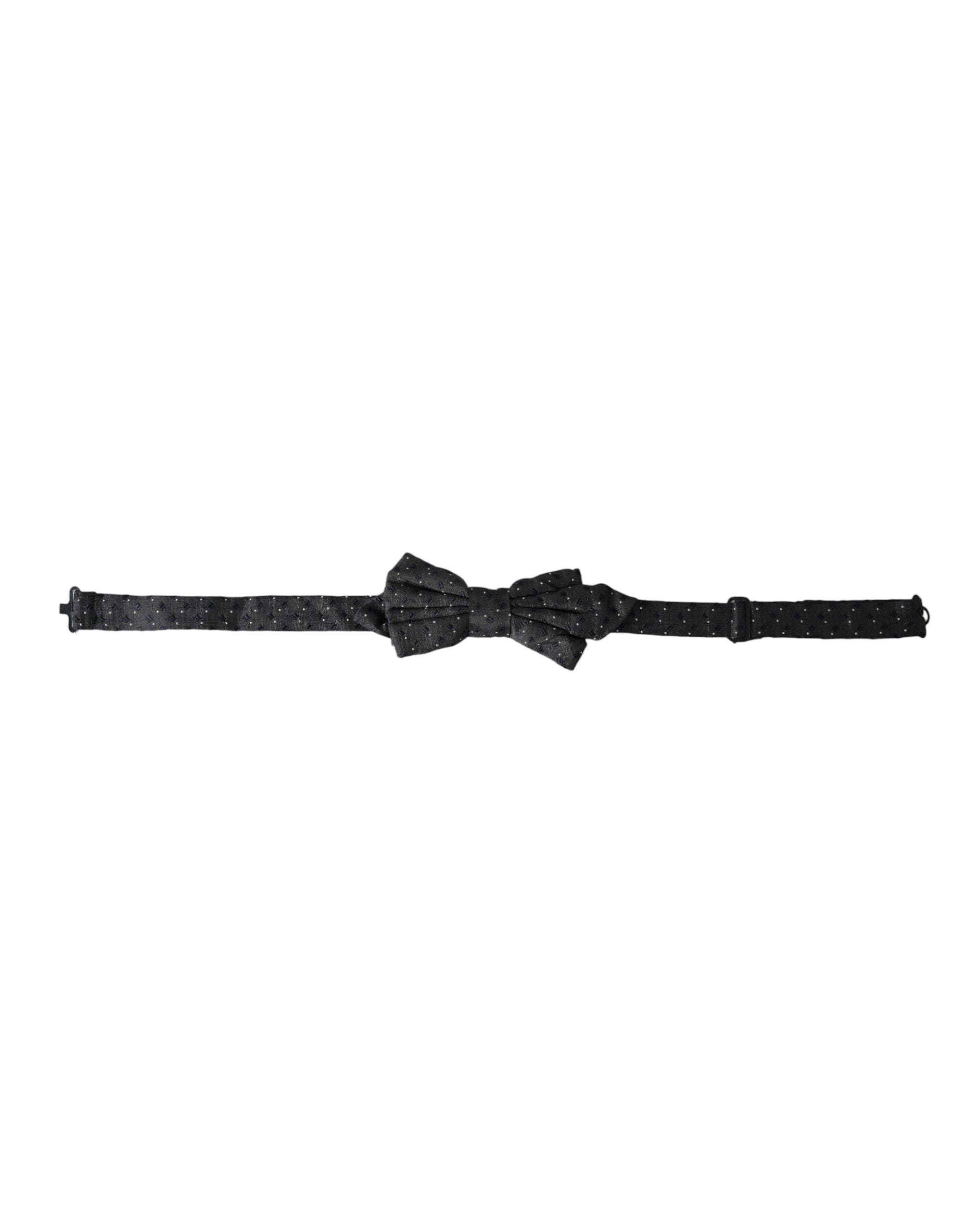 Black silk patterned adjustable neck bow tie for men by Dolce & Gabbana, featuring a classic papillon style with elegant design.