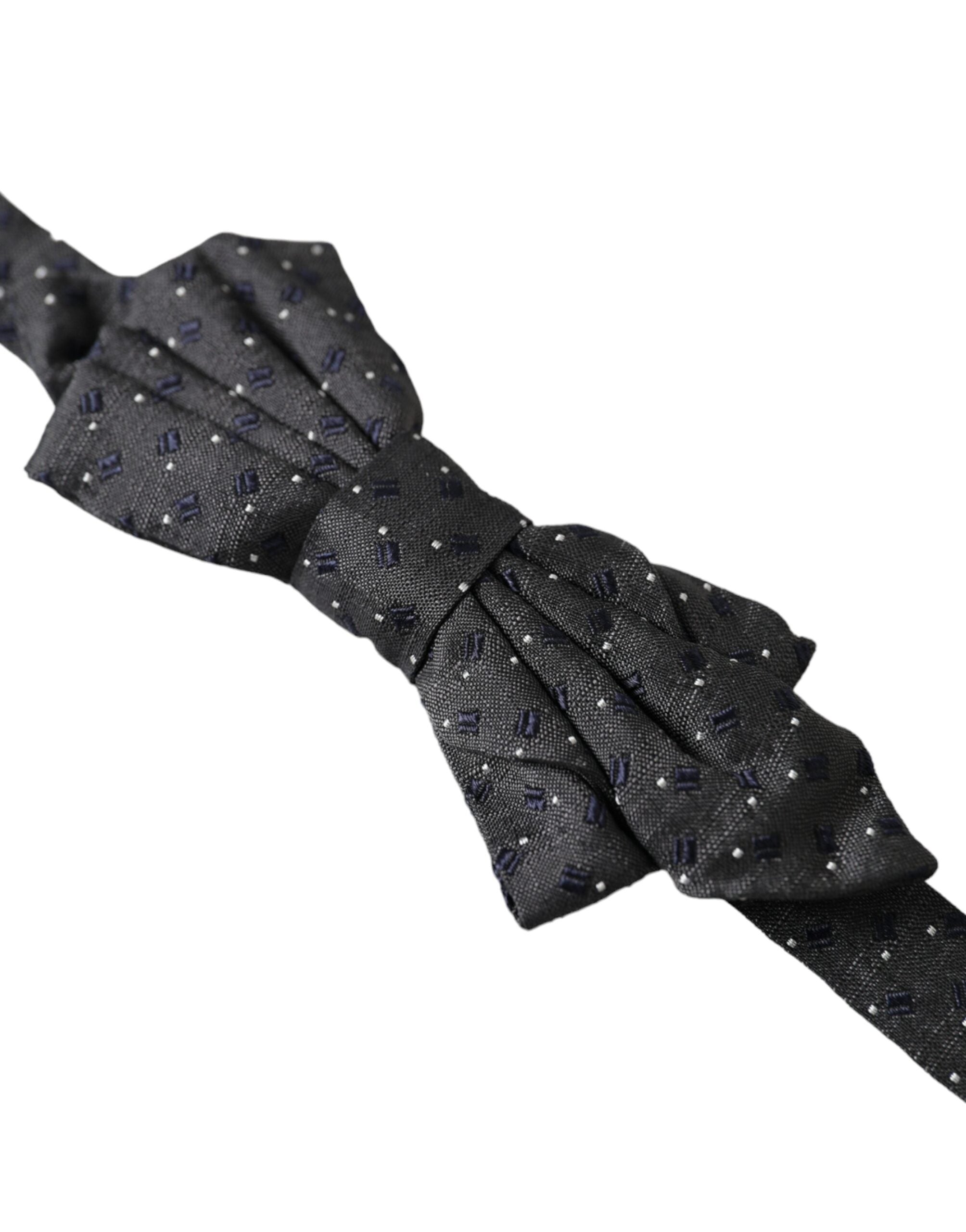 Black silk patterned adjustable neck bow tie for men by Dolce & Gabbana, featuring a stylish papillon design.