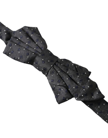 Black silk patterned adjustable neck bow tie for men by Dolce & Gabbana, featuring a stylish papillon design.