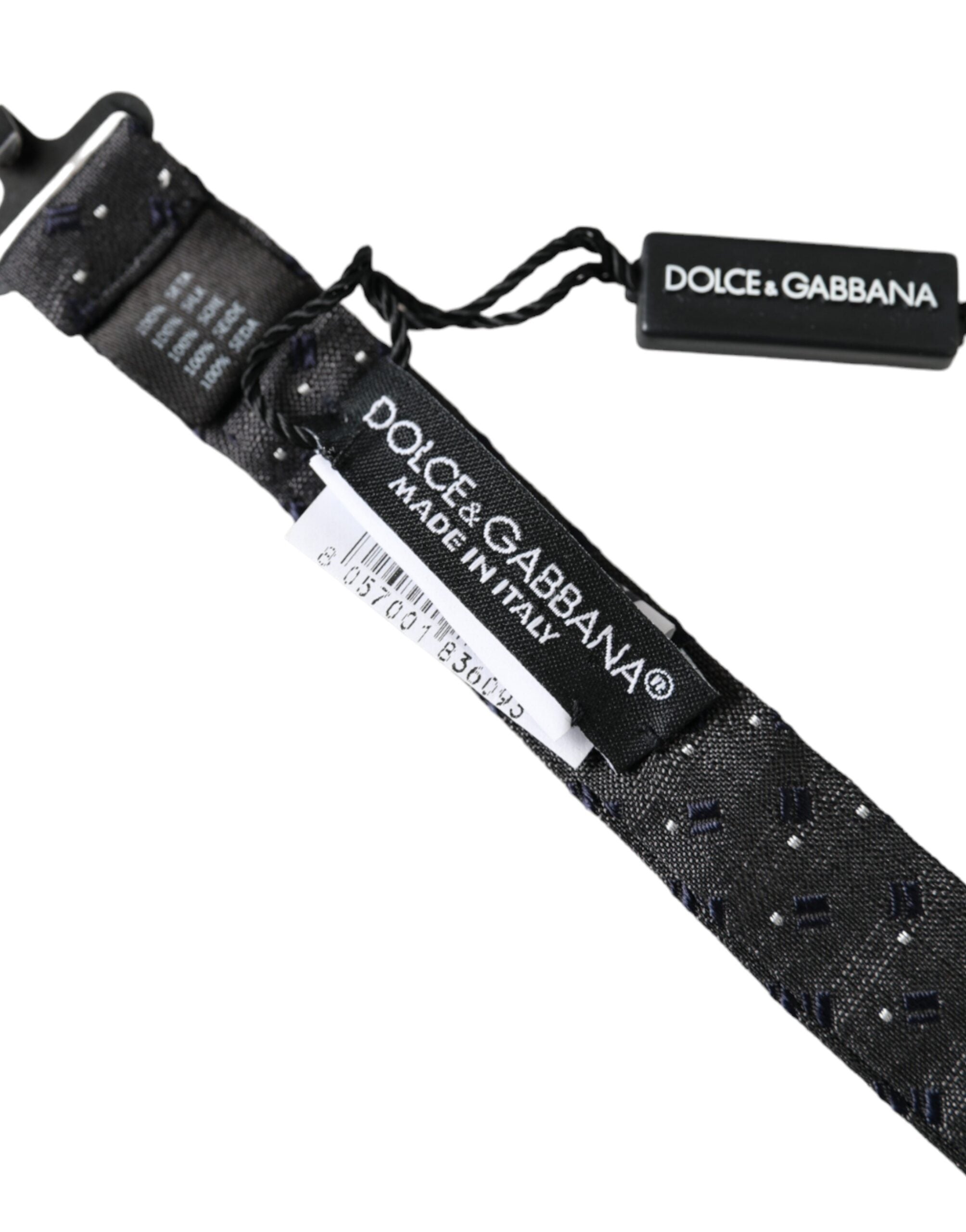 Black silk patterned adjustable neck bow tie for men by Dolce & Gabbana, featuring a stylish papillon design.
