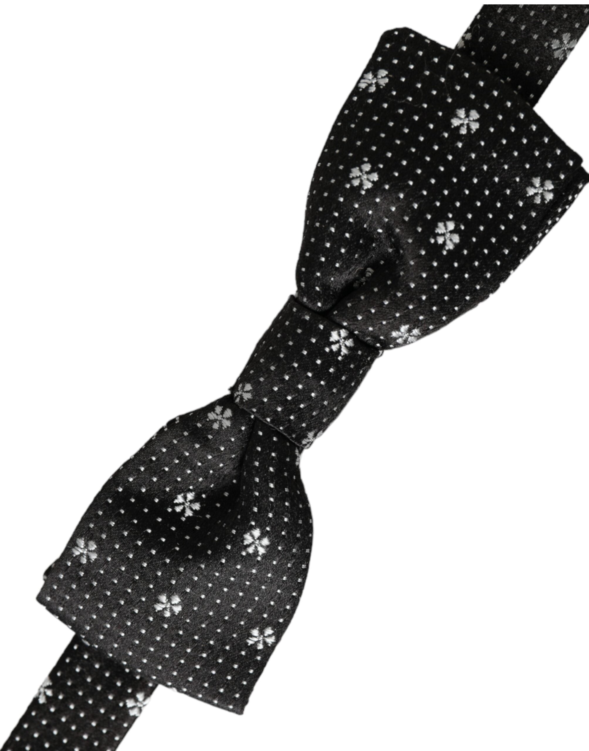Black silk floral adjustable neck bow tie for men by Dolce & Gabbana, featuring a stylish floral pattern and classic butterfly shape.