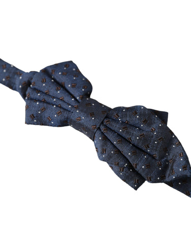 Navy blue silk patterned adjustable men's bow tie by Dolce & Gabbana, featuring elegant design and classic shape.