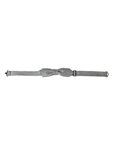 Gray silk polka dot adjustable neck bow tie for men by Dolce & Gabbana, featuring a classic polka dot pattern and elegant design.