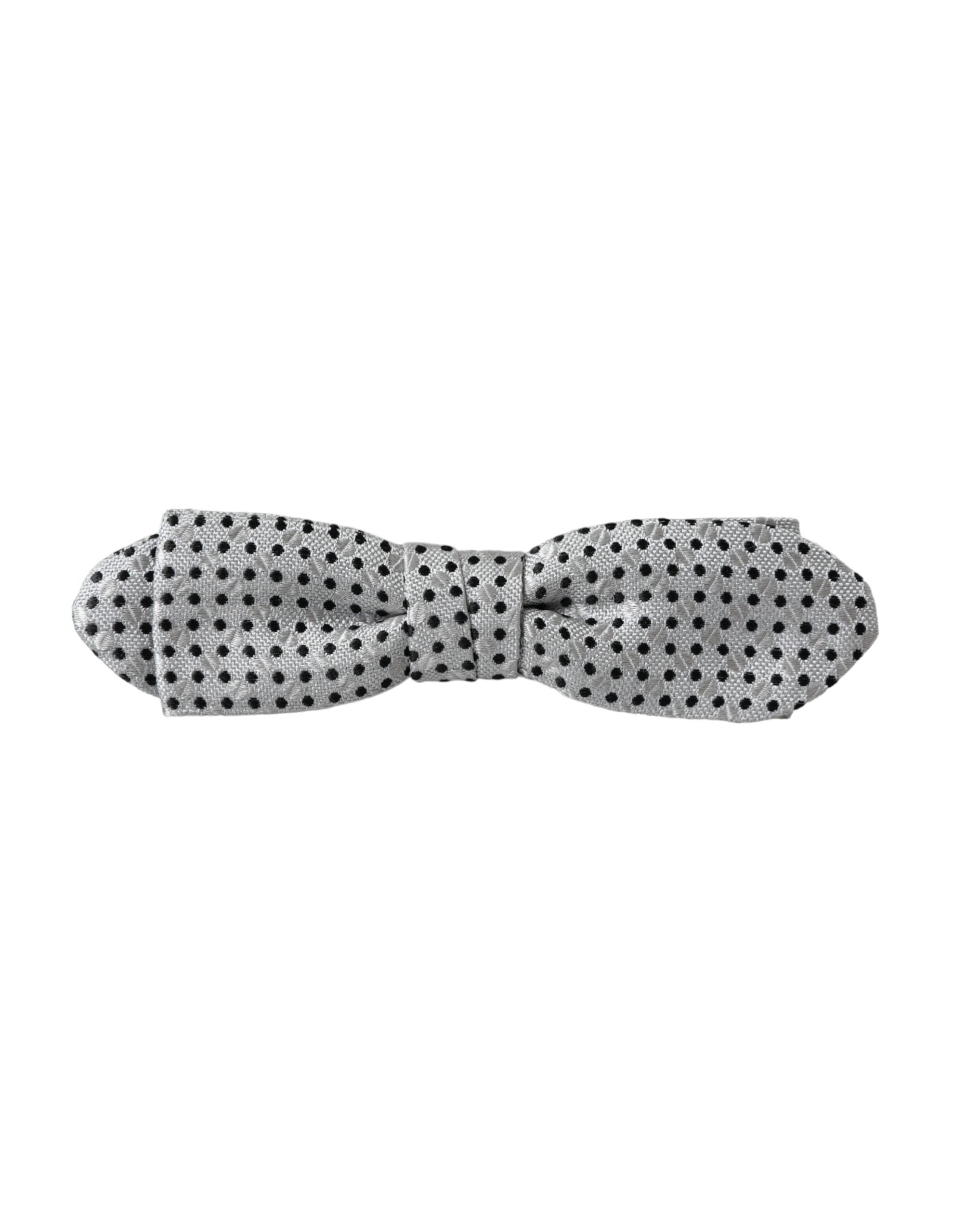 Gray silk polka dot adjustable neck bow tie for men by Dolce & Gabbana, featuring a classic polka dot pattern and elegant design.