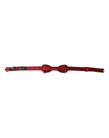 Red silk jacquard adjustable neck bow tie for men by Dolce & Gabbana, featuring intricate pattern and elegant design.
