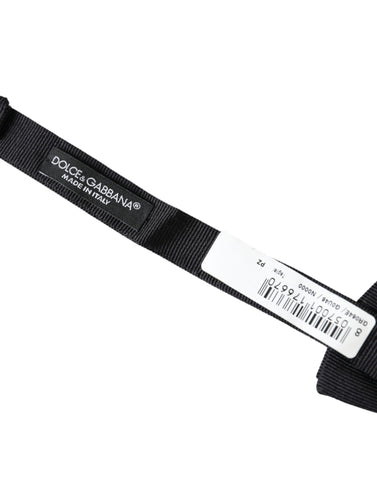 Black silk adjustable men's bow tie from Dolce & Gabbana, featuring a classic style and elegant silk fabric.