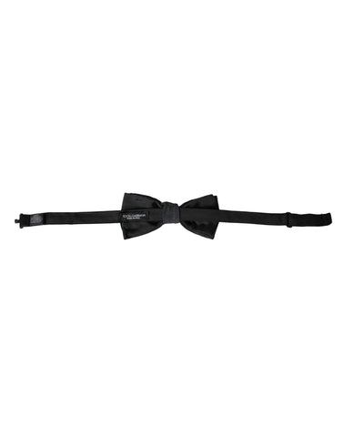 Dark gray silk adjustable men's bow tie by Dolce & Gabbana, featuring a classic and elegant design with a neat bow shape.