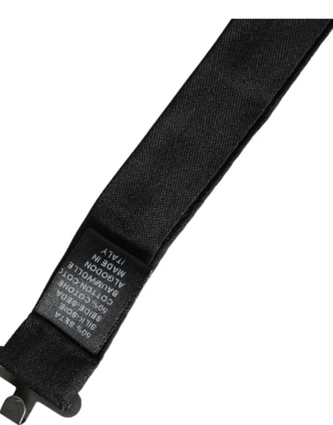 Dark gray silk adjustable men's bow tie by Dolce & Gabbana, featuring a classic design with a smooth, shiny finish.