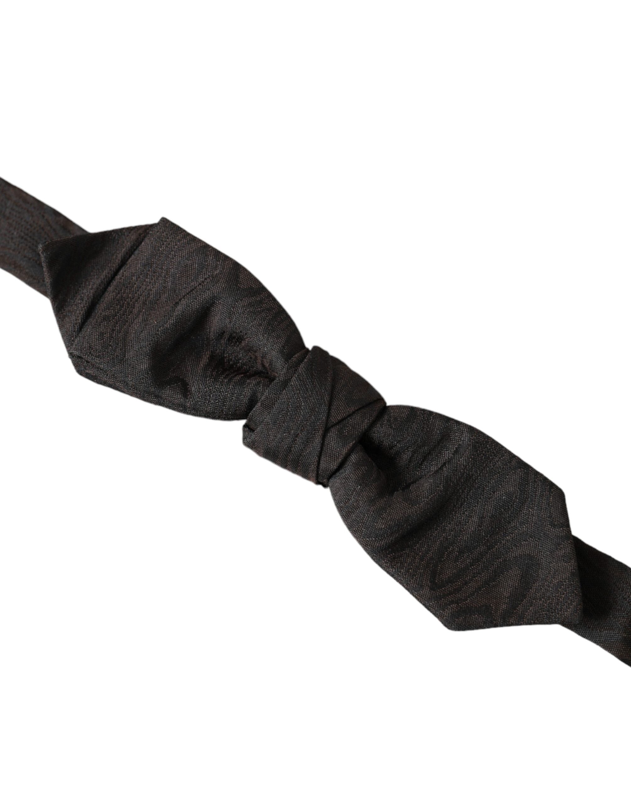 Black silk adjustable men's bow tie from Dolce & Gabbana, featuring a sleek, elegant design for formal wear.