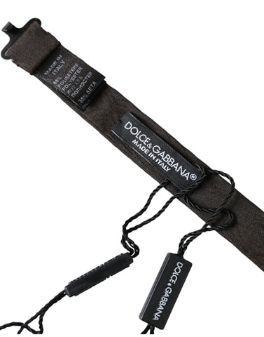 Black silk adjustable men's bow tie by Dolce & Gabbana, with a classic design and elegant silk fabric.